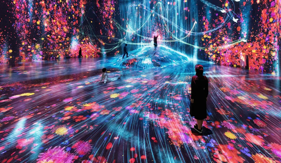 Visual for this record: teamLab Borderless runs on projectors and sensors, not holograms